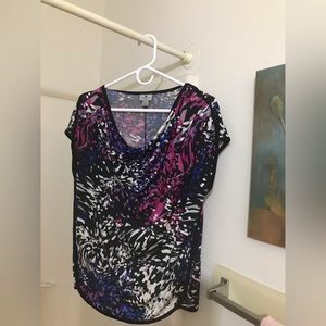 Small women blouse but looks like a Medium size.